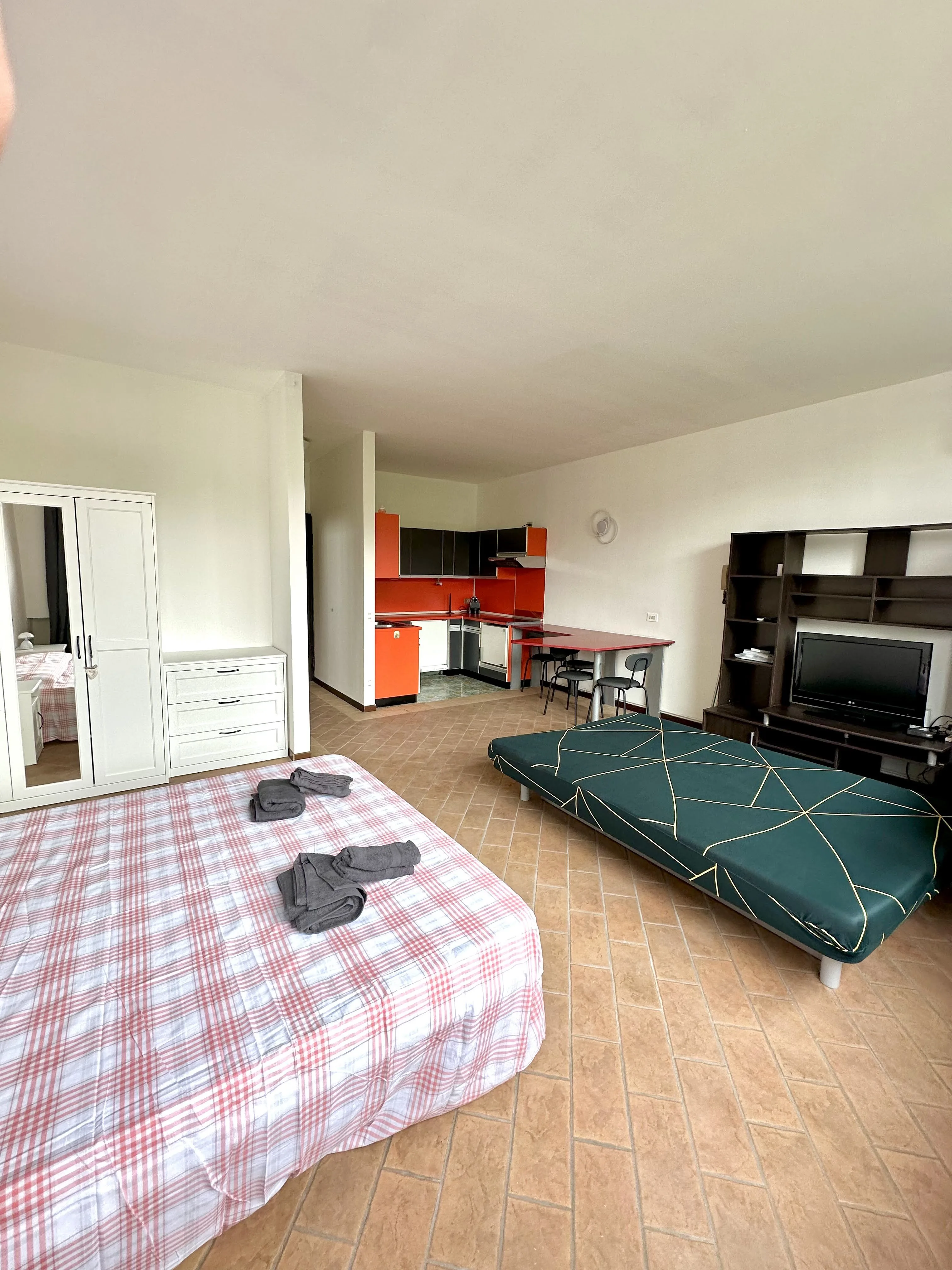 Soggiorno con letto aggiuntivo